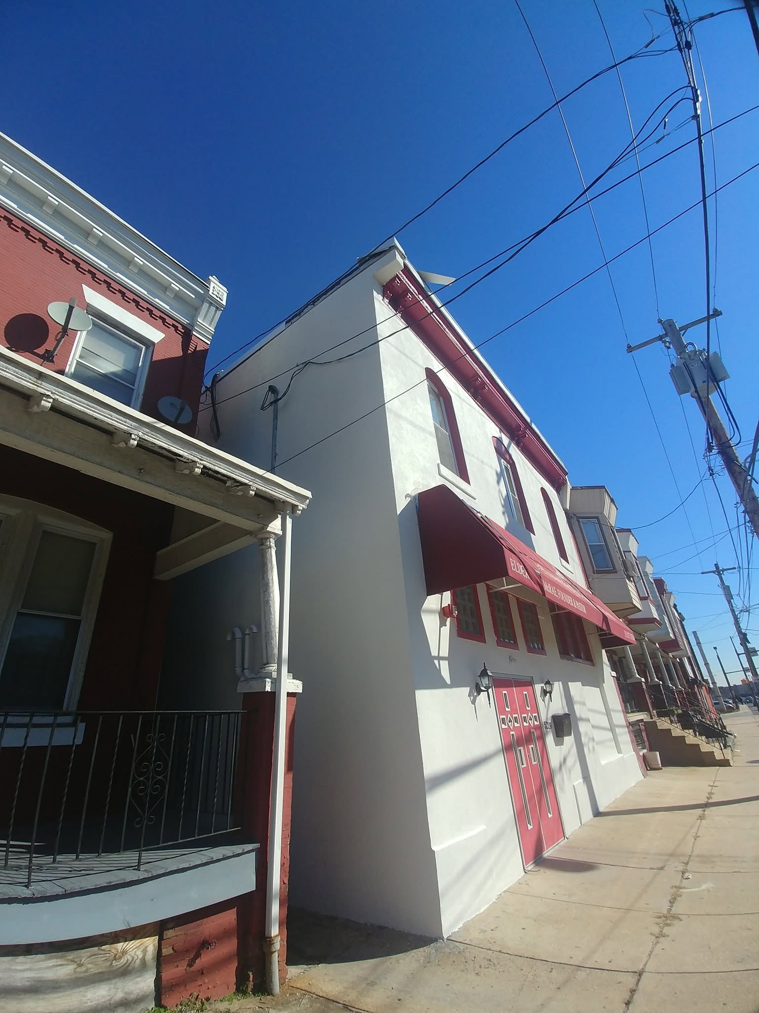 Fellowship Evangelistic Church red and white church building in Philadelphia